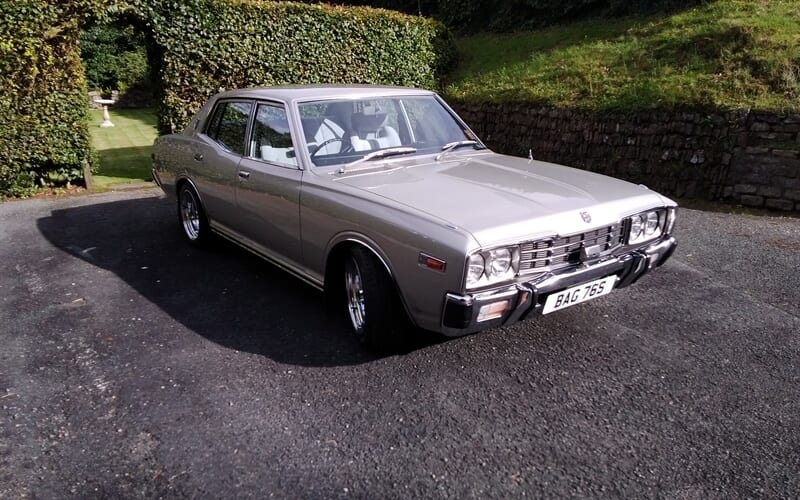 Year in review - Datsun 280c front view - AM Restorations